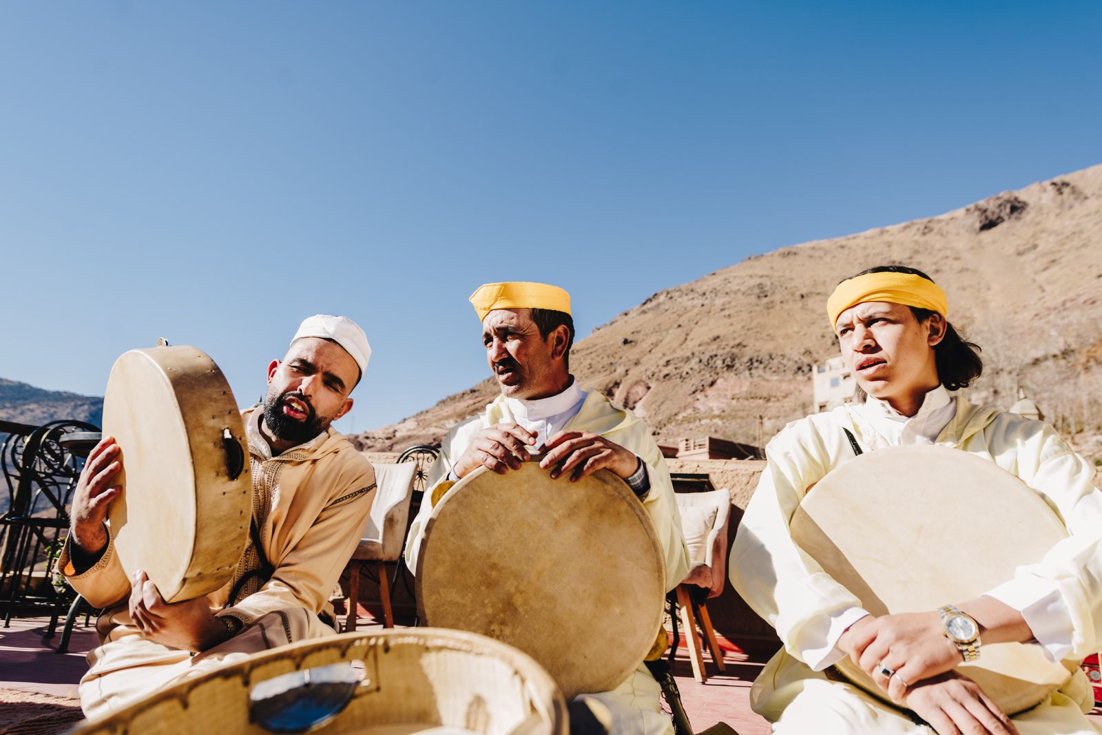 Musicians playing traditional bendir drums during the celebration